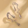 Boucles d'oreilles irrégulières liquides pour femmes, boucles d'oreilles pendantes en métal à géométrie exagérée, bijoux de créateur, accessoires de fête pour femmes, cadeaux