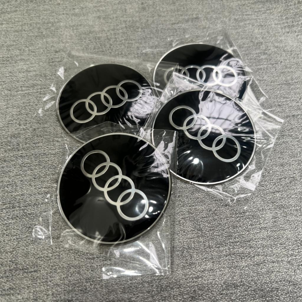 4PCS 65mm automobile hub center cover sticker is suitable for Audi ABT A3A4A5Q2 Q7 RSTT hub aluminum alloy modification sticker.