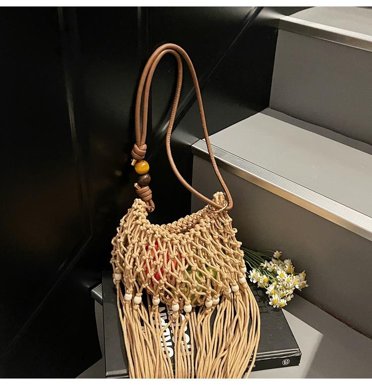 

Новая плетеная модная полая нишевая сумка на одно плечо под мышку с кисточками в стиле ретро для весенне-летнего морского отдыха хаки