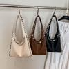 Trendy Retro One-Shoulder Rivet Bag with Textured Design