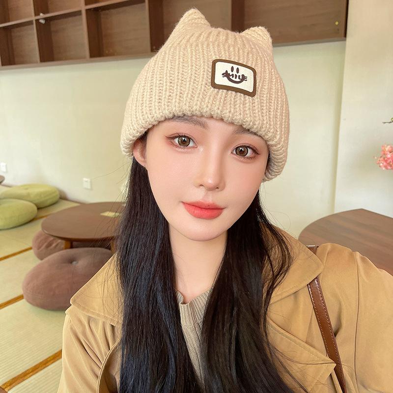Autumn and winter new labeling cold hat versatile smiley face wool hat women's big head circumference ear protection warm hat thickened knitted hat