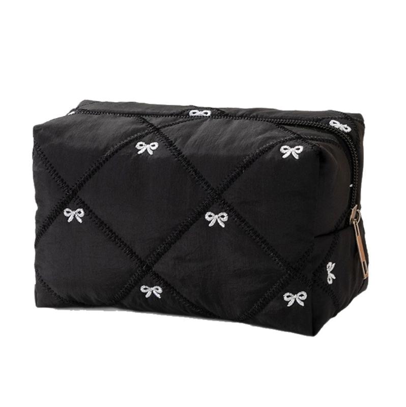 

Large Capacity Polyester Cosmetic Pouch Including Elegant Quilting Designs and Compartments for Makeup Management