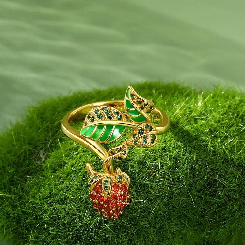 

Милое и уникальное кольцо в виде клубники с капающим маслом 9