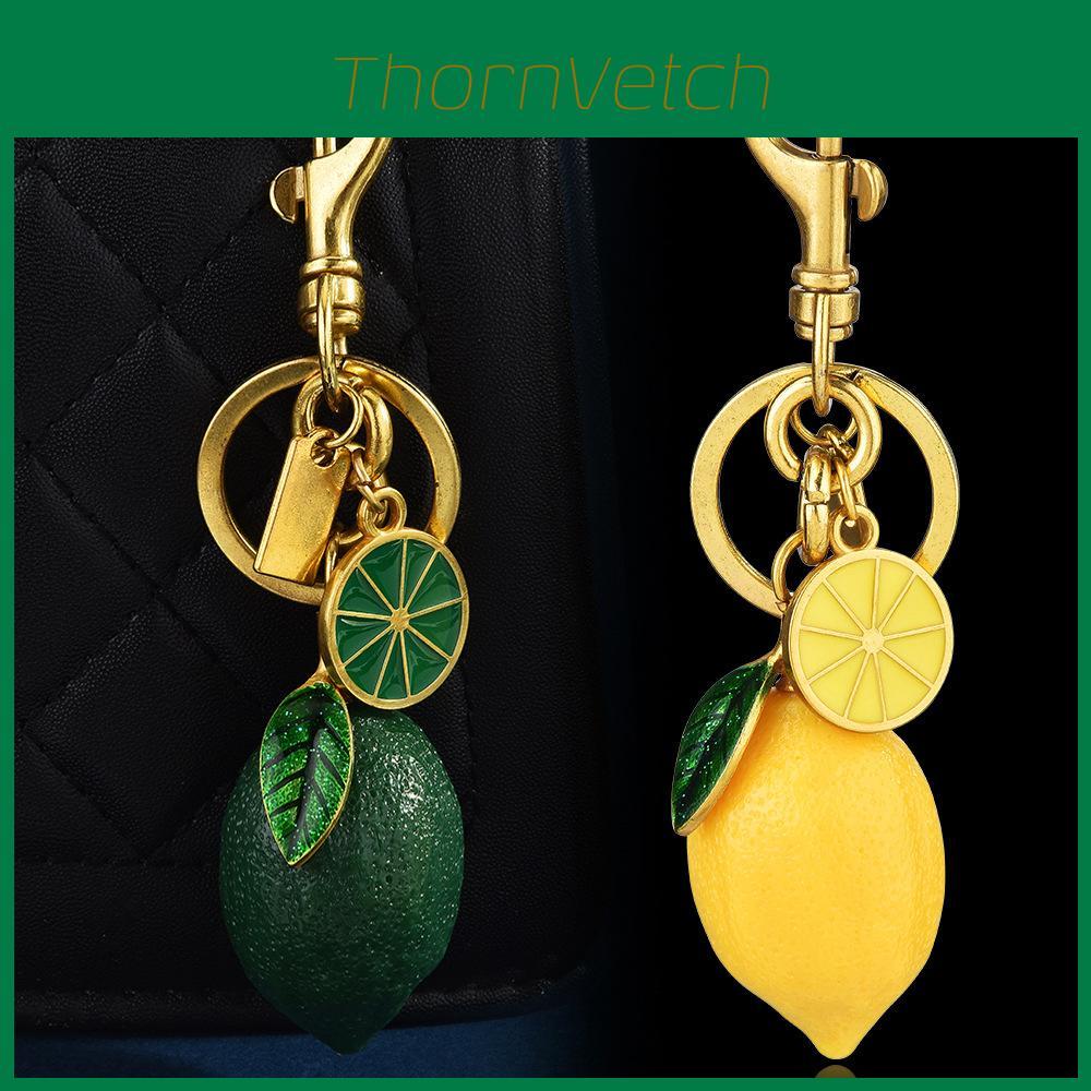 Fruit Bag Charm Key Holder With Electroplated Alloy Material And Lemon Pattern For Women