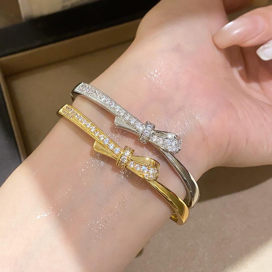 18k Gold Plated Oval Bracelet with Diamond Inlay - Butterfly Knot Design