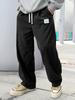 Herren Cord-Hose mit Kordelzug und weitem Bein mit seitlichem Logo-Patch - Lässige Streetwear-Hose