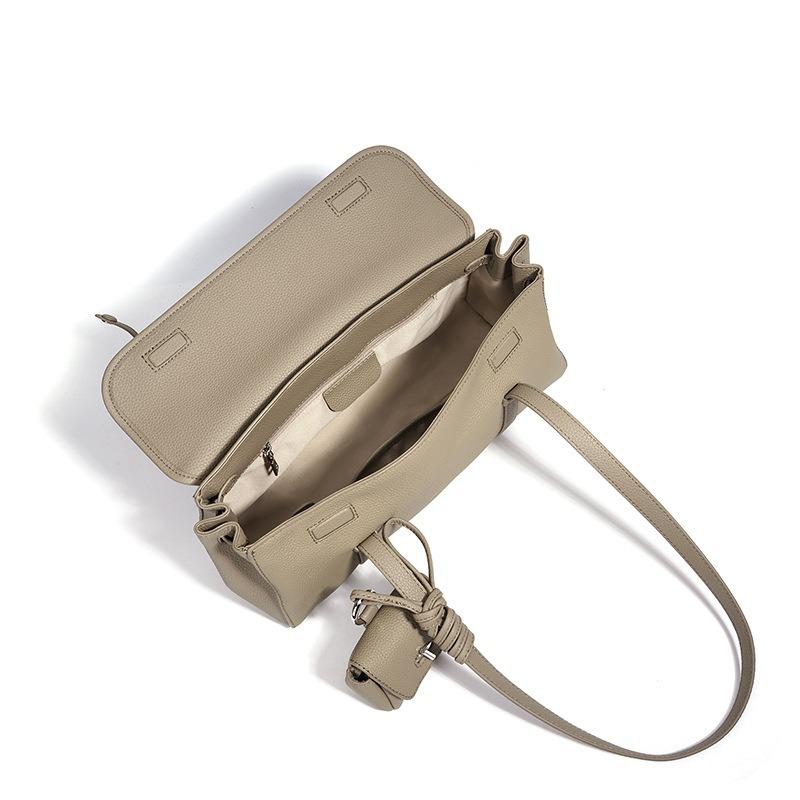 Spring and summer new lychee pattern armpit bag women's commuter versatile baguette bag niche design leather shoulder bag