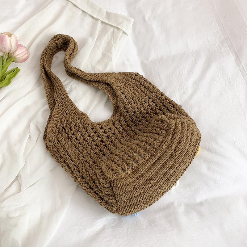 

Leisure large-capacity new hollow lazy literary style shoulder armpit bag vacation beach bag portable women s bag