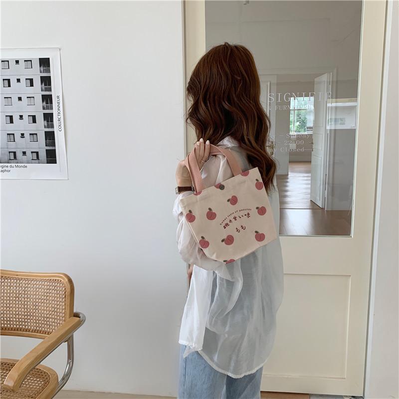 Borsa da donna Ragazza carina Pesca giapponese stampata Borsa tote casual Borsa da pranzo piccola in tela Borsa da donna portatile Mini Shopper
