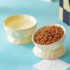 Ceramic Cat & Dog Feeder: Cute, Slanted Double Bowl with High-Leg Design for Neck Protection and Anti-Tip Stability.