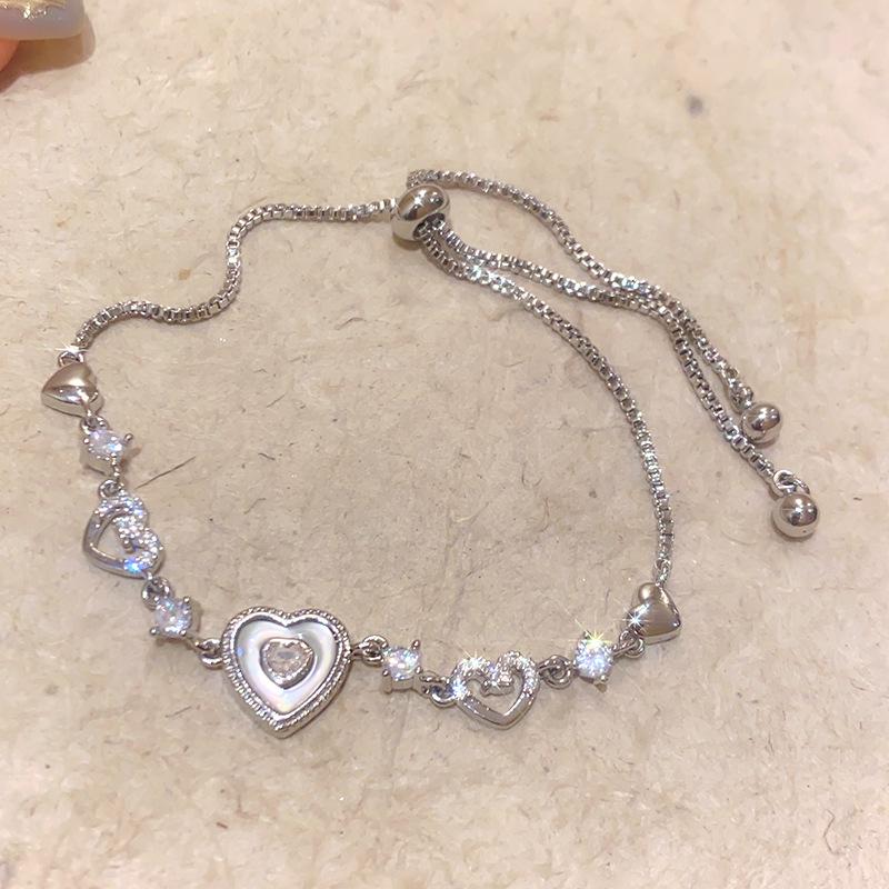 

Елегантний корейський браслет у формі серця з цирконами та перламутром - Універсальна, легка розкішна жіноча прикраса
