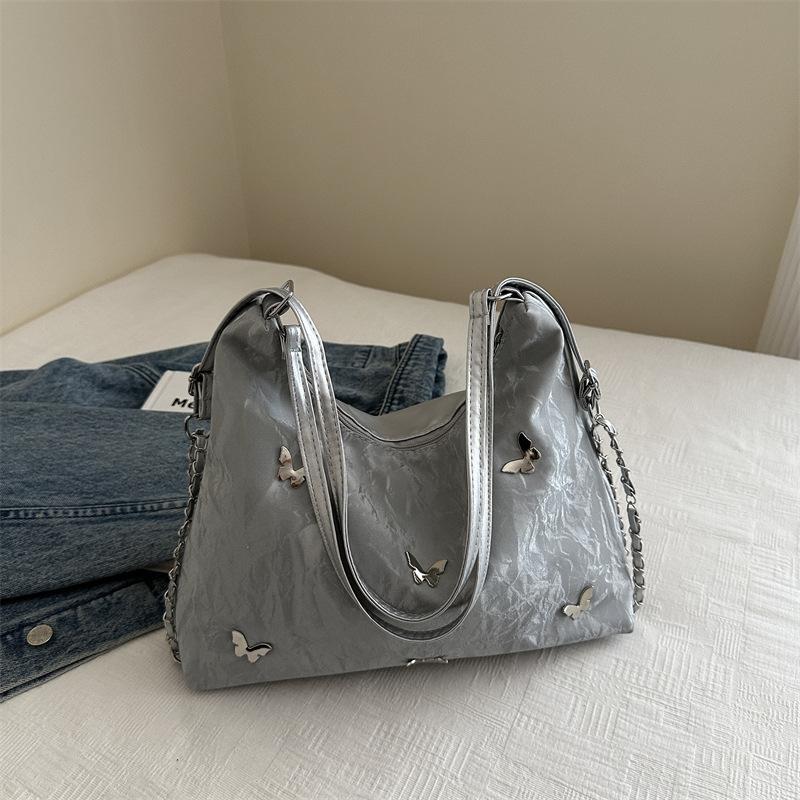 

Large capacity bag women 2025 new casual niche design commuting personality trend double shoulder single shoulder crossbody backpack серебряный