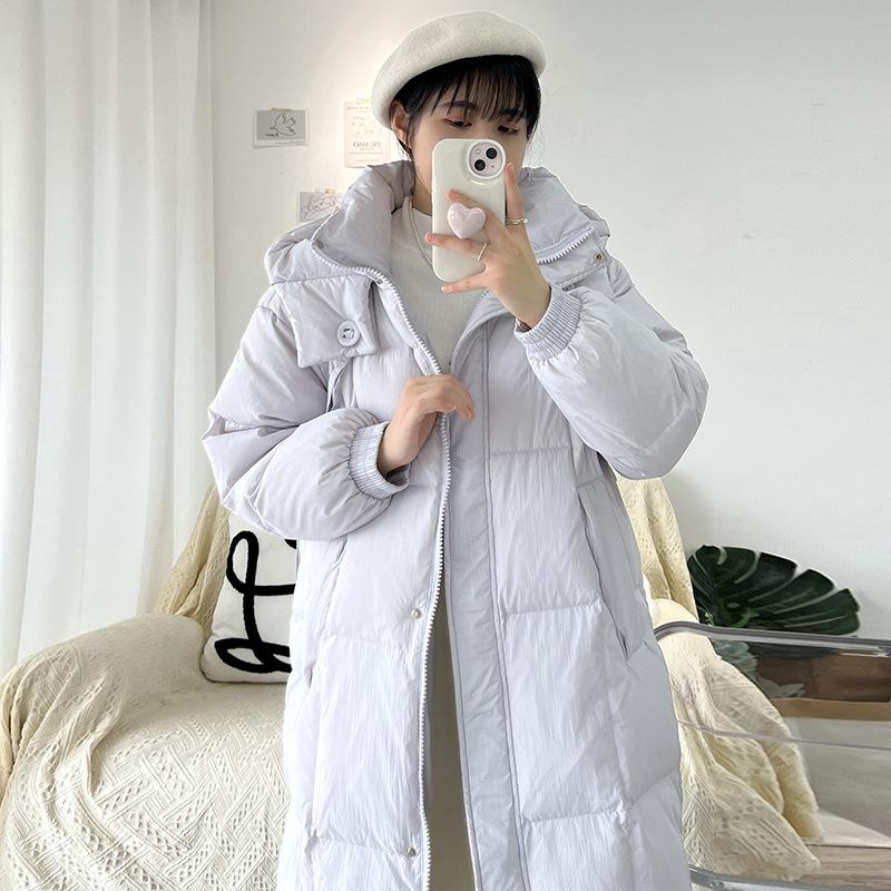 High-rise white duck down long down jacket women's 2024 new thickened hooded sweet warm loose meat cover over the knee