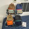 Schoolbag1011 new high-value contrasting color splicing backpack bag, male and female students schoolbag, outdoor travel backpack, large capacity