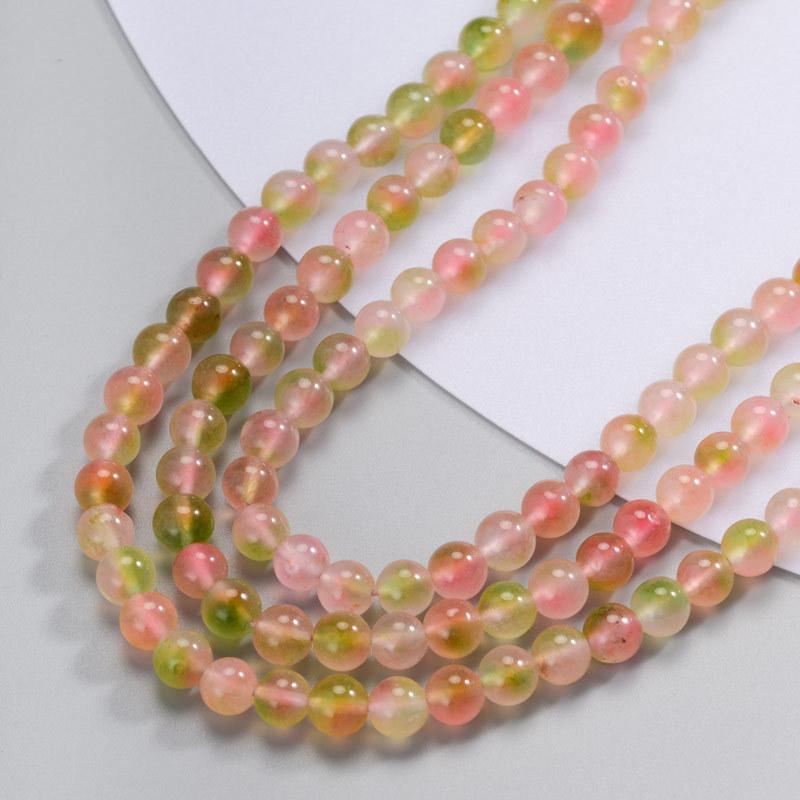 

Бусины из халцедона цвета персикового цвета: Яркие и живые, как молодые цветки персика, озаряющие лето своим великолепием.