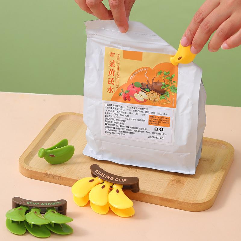 Kunststoff Bananen Magnetverschluss Feuchtigkeitsdicht Handpresse Frischhalteclip Multifunktionaler Haushalts-Lebensmittelbeutelclip