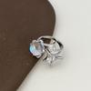 Influencer Starry Moonstone Ring with Iridescent Diamond Star Design