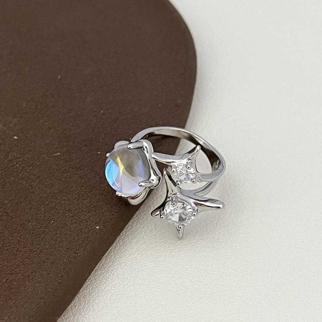Influencer Starry Moonstone Ring with Iridescent Diamond Star Design