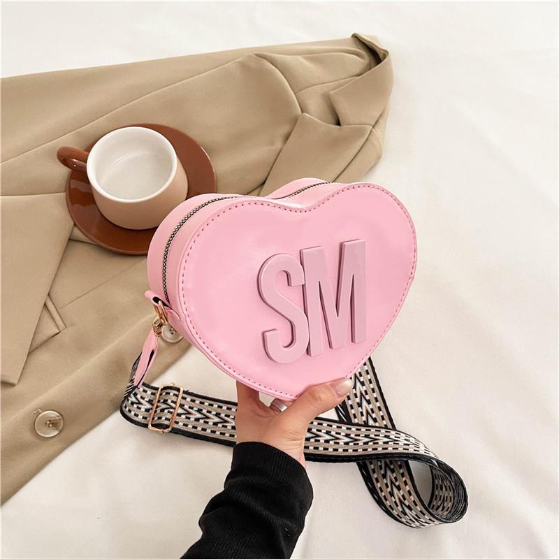 

2025 весна и лето новая мода иностранный стиль сумка в форме сердца простая трендовая сумка через плечо повседневная милая индивидуальная сумка-мессенджер для женщин розовый