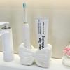 Visually Appealing Ceramic Toothbrush Holder with Bow Design Moisture-Resistant Bathroom Organizer, Freestanding Modern Vanity Decor for Countertop,