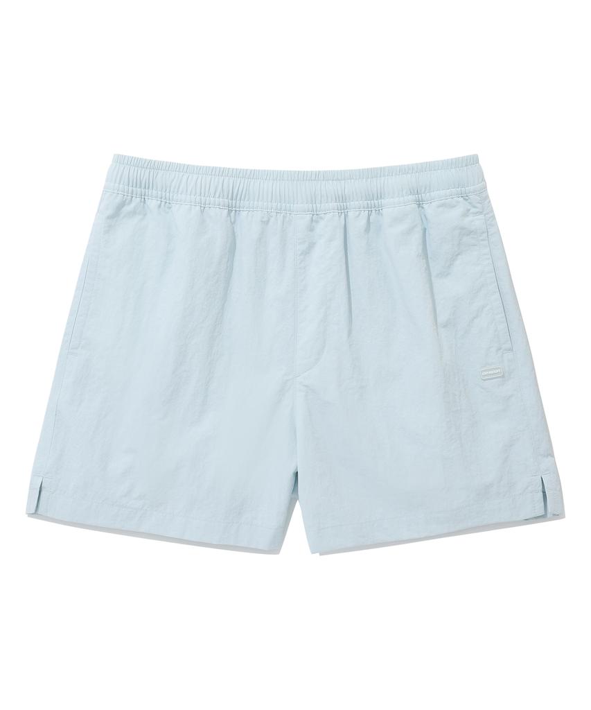 COVERNAT WOMAN Sheer Nylon Windbreaker Shorts Light Blue