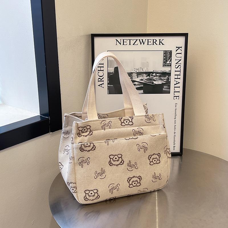 

New women s bag printed portable tote bag cartoon KT cat hand bag canvas backpack office worker thermal insulation bento bag