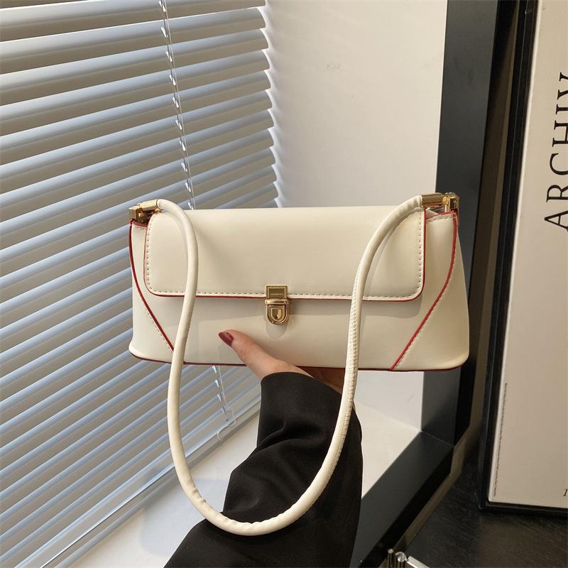 Geantă baguette nouă design nișă sens high-end simplă retro geantă de umăr texturată femei