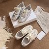 Bow lace-up German training shoes women's autumn 2025 new fashion versatile skirt sports and leisure white shoes