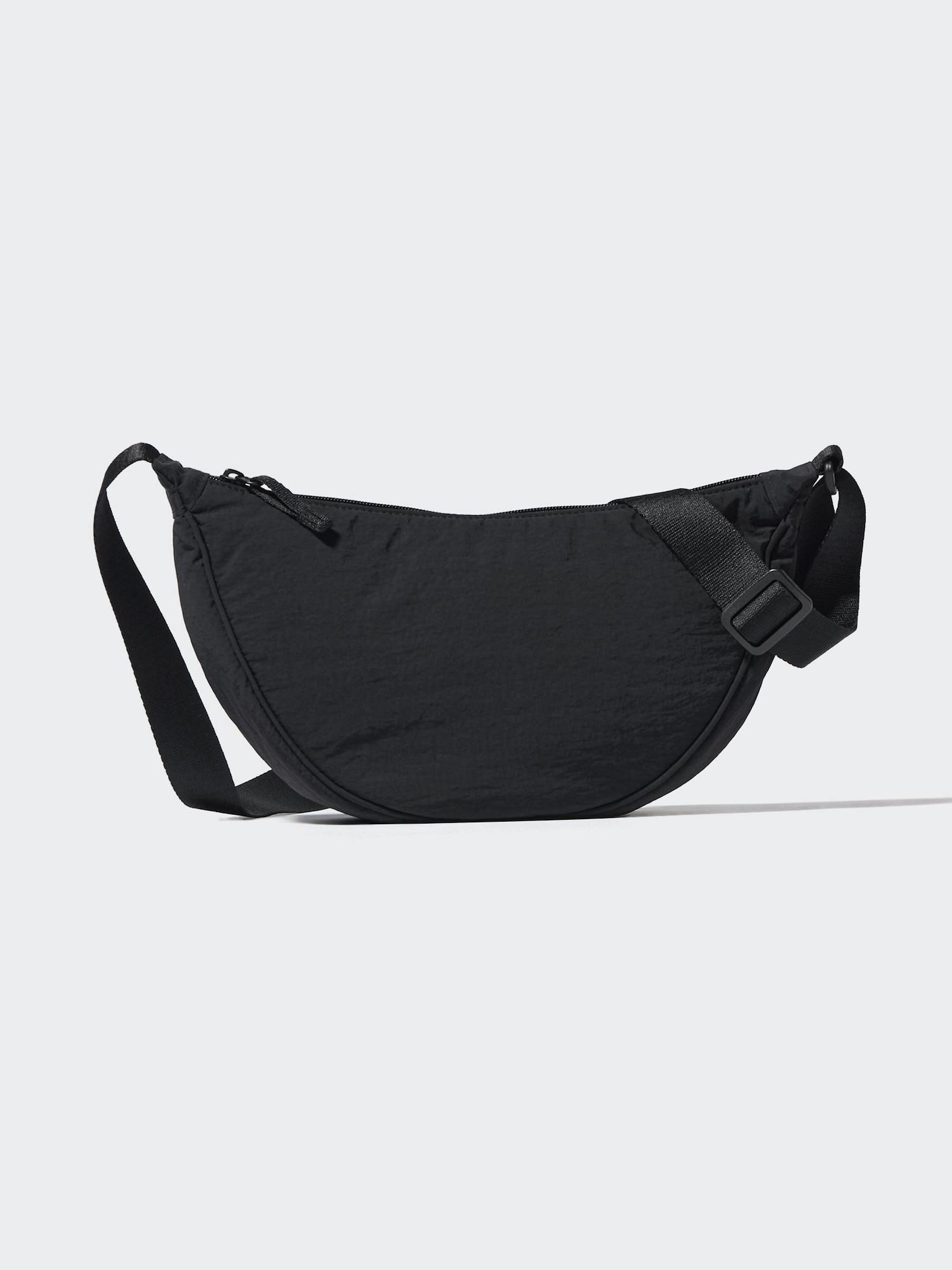 

Круглая мини-сумка через плечо Uniqlo Japan 09 BLACK/ONE SIZE