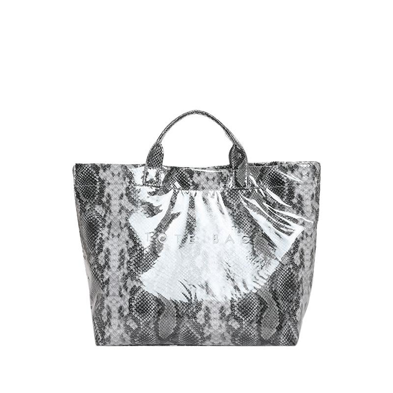 Women's bag 2025 new European and American fashion printed snake pattern handbag large capacity glossy versatile bucket bag tide