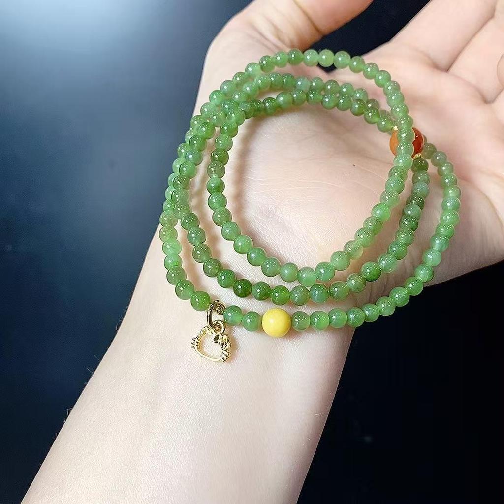 Hetian Green Jade Multi-strand Bracelet: Simple, Versatile, Fashionable, and Exquisite Women's Accessory.