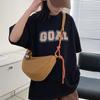 Simple dumpling bag casual 2025 new student schoolbag men's and women's shoulder messenger bag