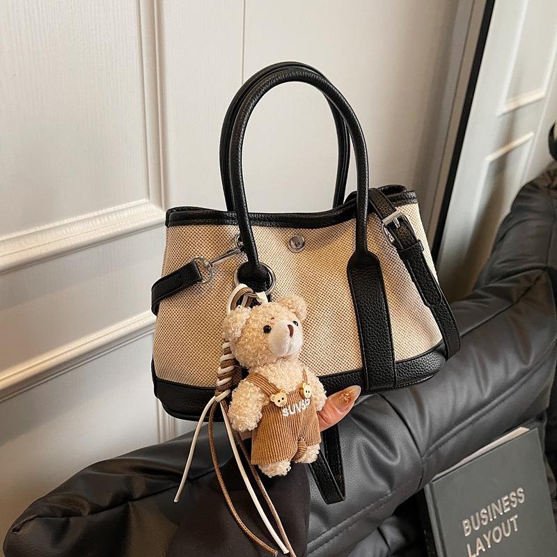 New contrasting color bucket bag women's commuter shoulder messenger bag bag large-capacity casual niche handbag