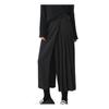 Pantaloni da donna stile scuro nero tinta unita plissettati finti due pezzi irregolari high street larghi gamba larga casual individuali lunghezza a metà polpaccio pantaloni culottes