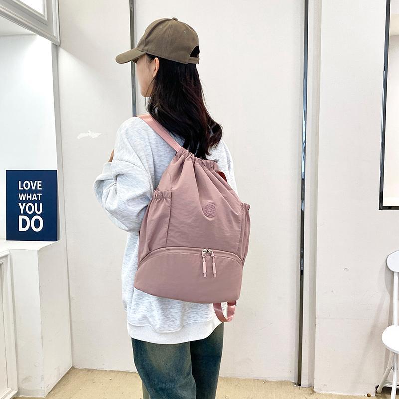 Schoolbag Korean backpack women's 1011 new lightweight casual fashion drawstring nylon backpack student travel mountaineering bag tide