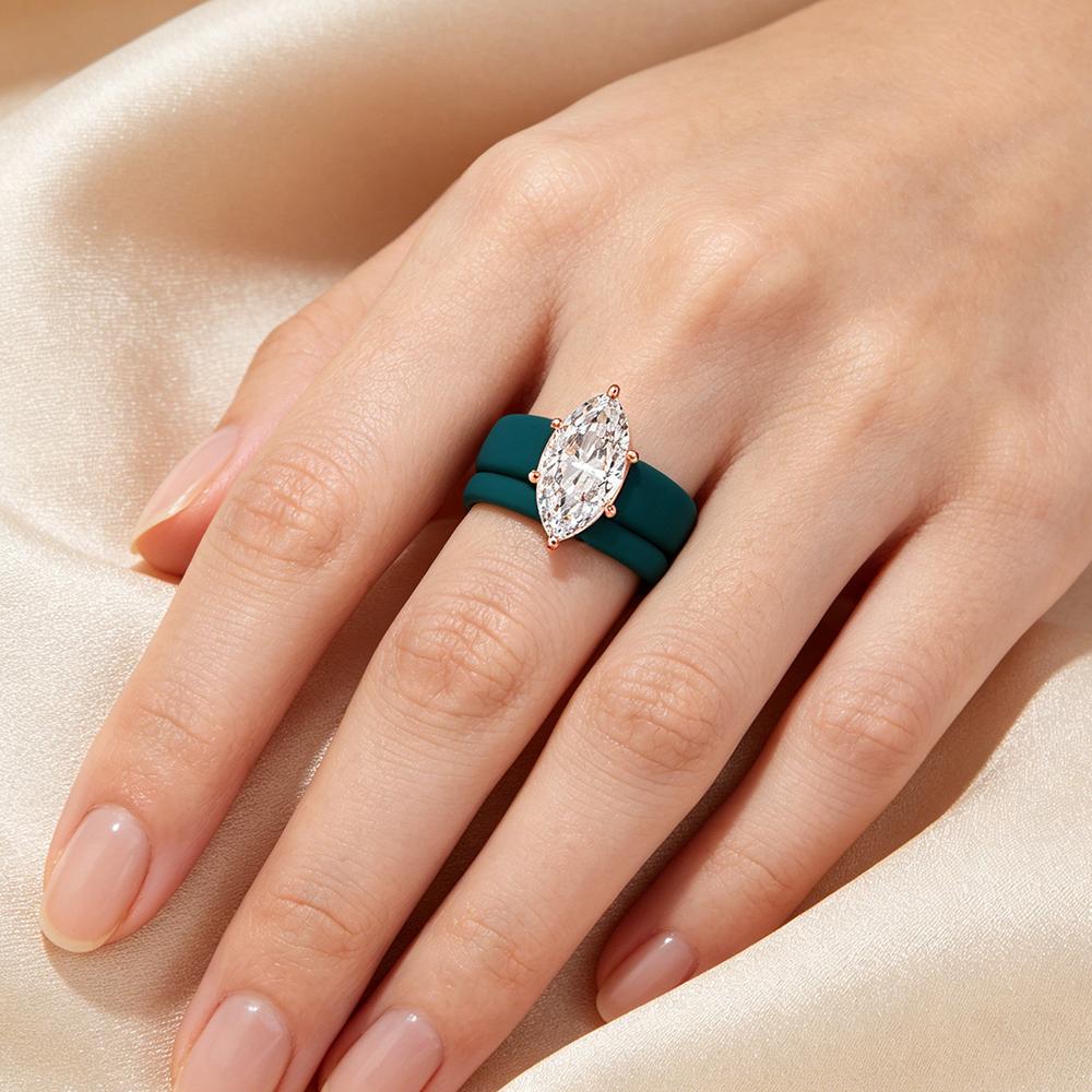 Rose gold CZ diamond silicone ring, paired with a blue silicone wedding ring, hypoallergenic, stackable elastic rubber ring