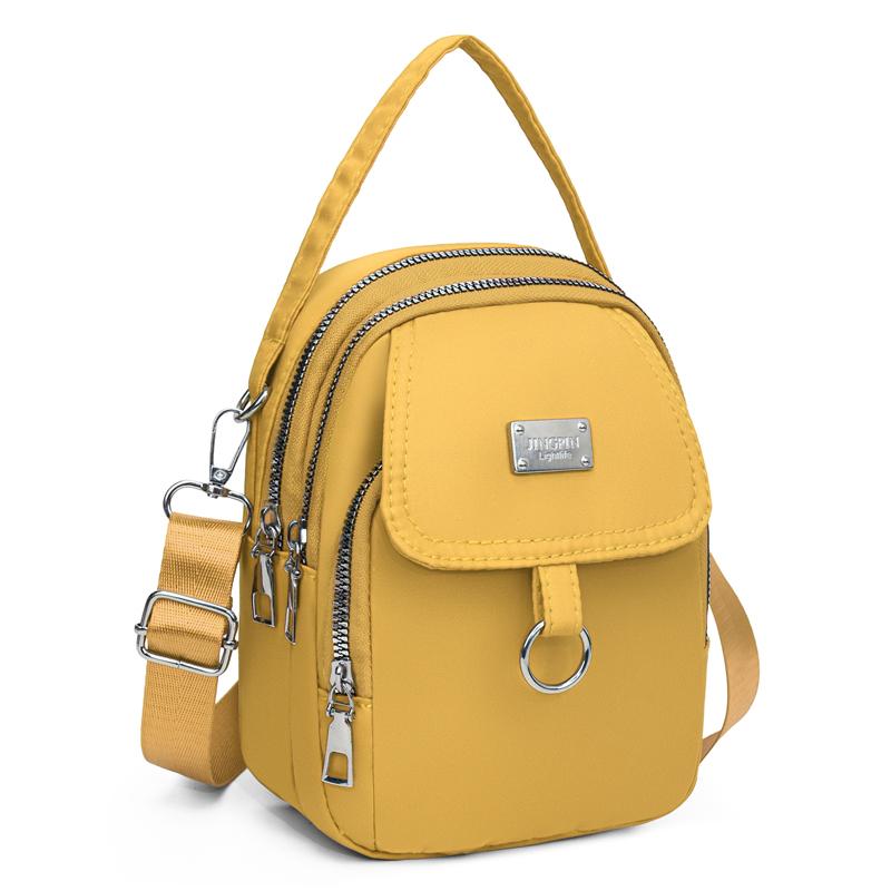 VOYAGEX Lichtgewicht nylon dames crossbodytas - Casual mini handtas met meerdere ritsvakken en afneembare schouderband. geel