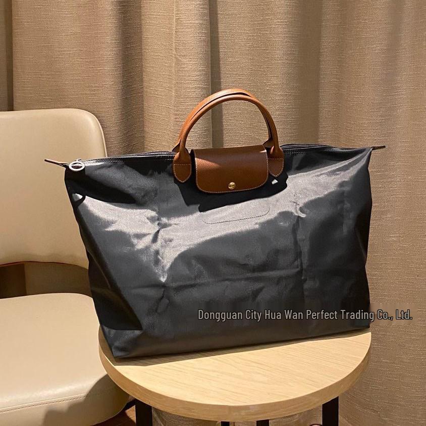 Xiangjia Large-Capacity Waterproof Oxford Travel Tote Bag, Lightweight and Foldable.