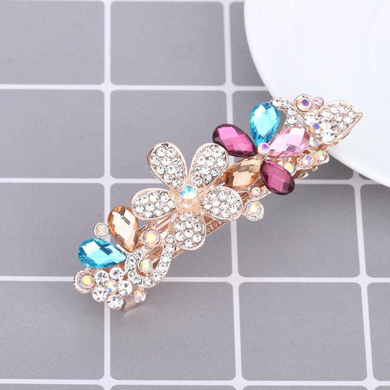 Mengpei Large Crystal Flower Hair Clip: Elegant Rhinestone Ponytail Accessory for Women.