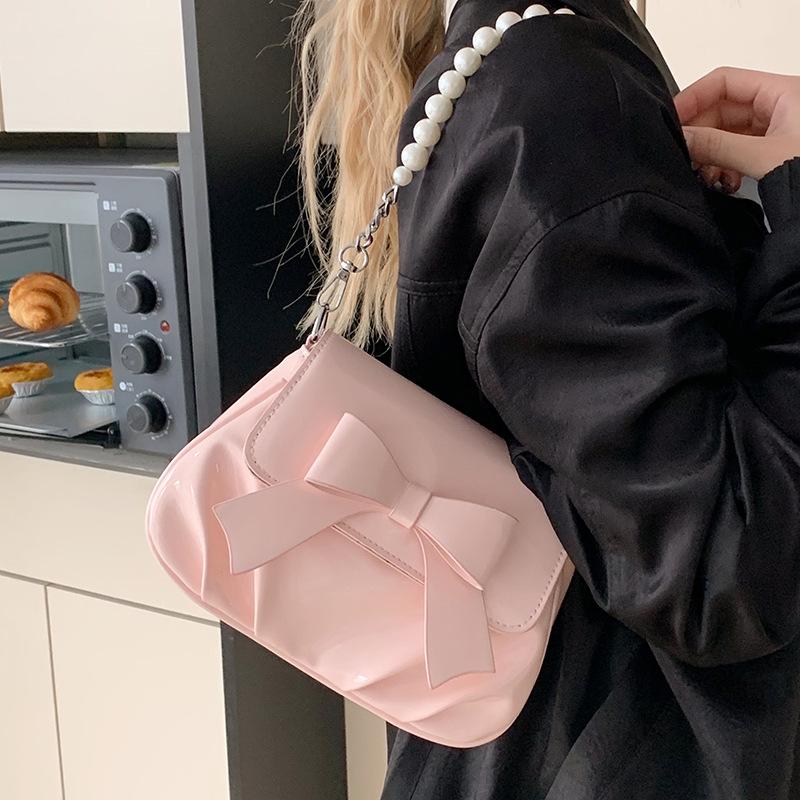 This year, French sweet style bow chain small bags are popular, fashionable and versatile, foreign style and advanced sense messenger women's bags.