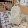 Plaid backpack for womeninsLarge-capacity student backpack in college style, lightweight, casual, and versatile for high school