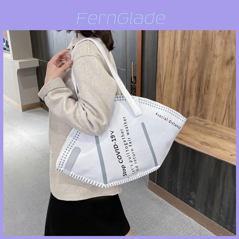 Fashionable Creative Mask Design Handbag With Spacious Capacity For Trendy Shoppers