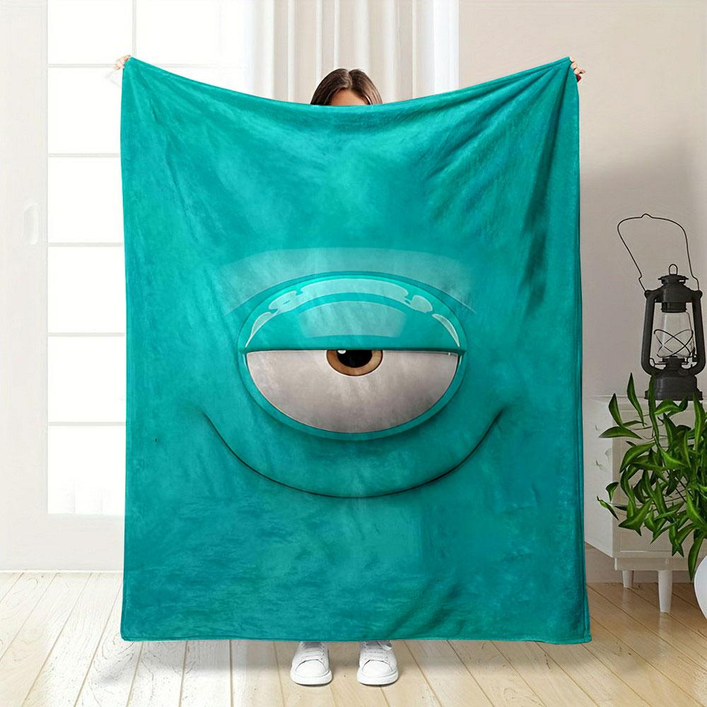 A single eye on a smooth teal background with curved smile-like contours. for all seasons blanket lunch break throw gift