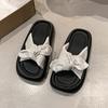 Korean version of Internet celebrity muffin bottom cool slippers women wear versatile comfortable knotted sandals 2025 summer new one-word drag