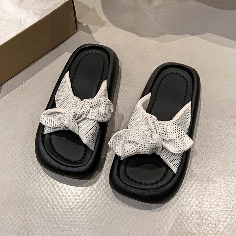 Korean version of Internet celebrity muffin bottom cool slippers women wear versatile comfortable knotted sandals 2025 summer new one-word drag