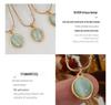 French Retro Clavicle Chain Necklace: 18k Gold-Plated Titanium Steel with Cat's Eye Oval Pendant for Women