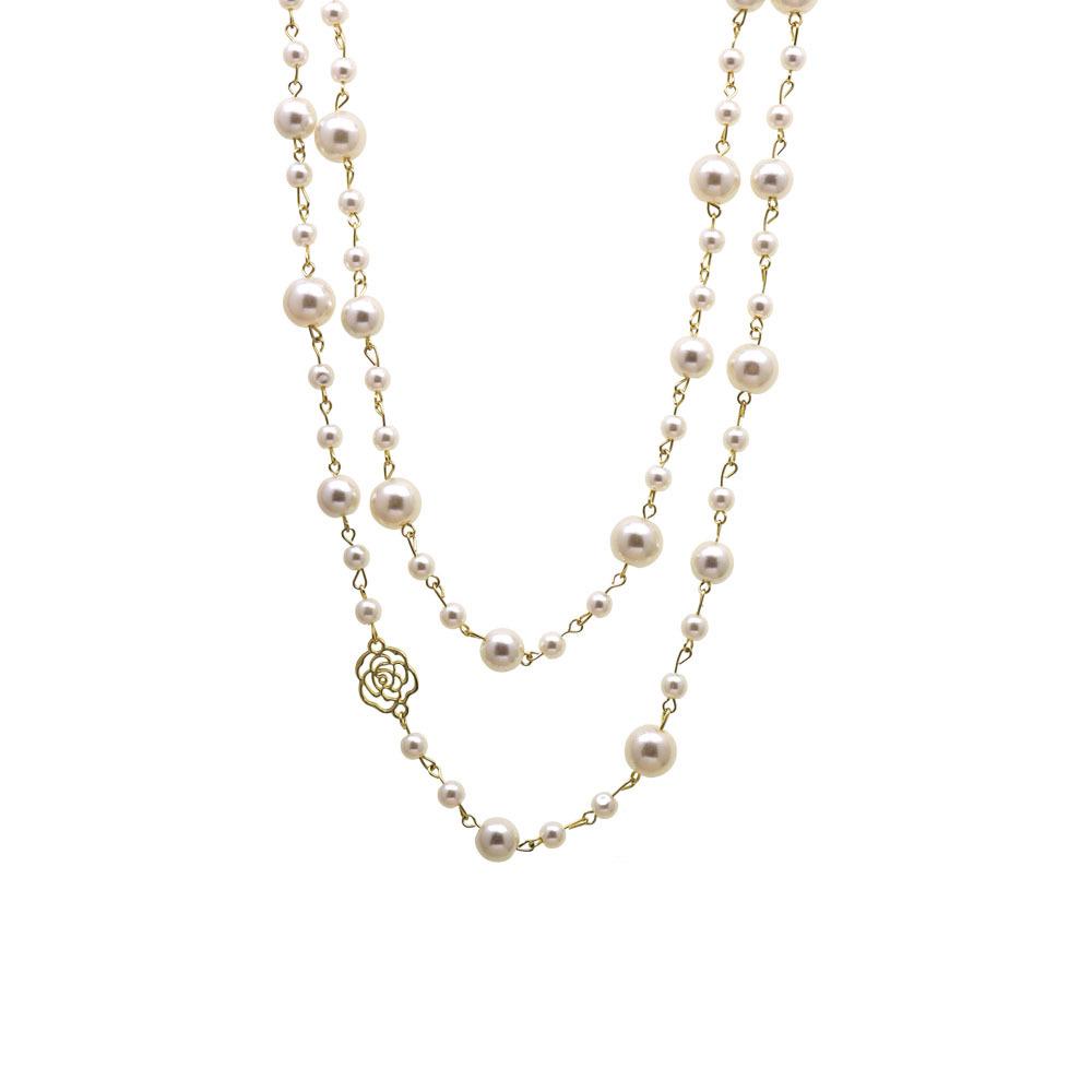 Korean Long Pearl Necklace: Trendy Multi-layer Hollow Flower Sweater Chain for Women