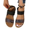Sommer 2025 neue europäische und amerikanische Leopardenmuster flache Sandalen Damen vielseitig runde Zehen bedecken Füße tragen Strandsandalen