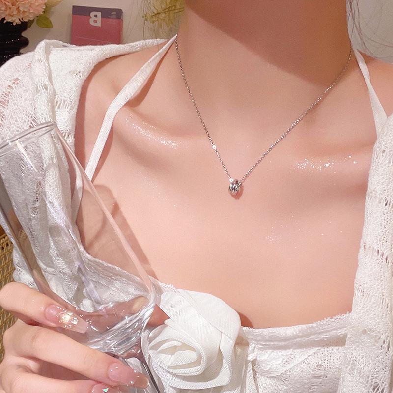 "Elegant Korean Titanium Steel Zircon Bow Necklace for Women"