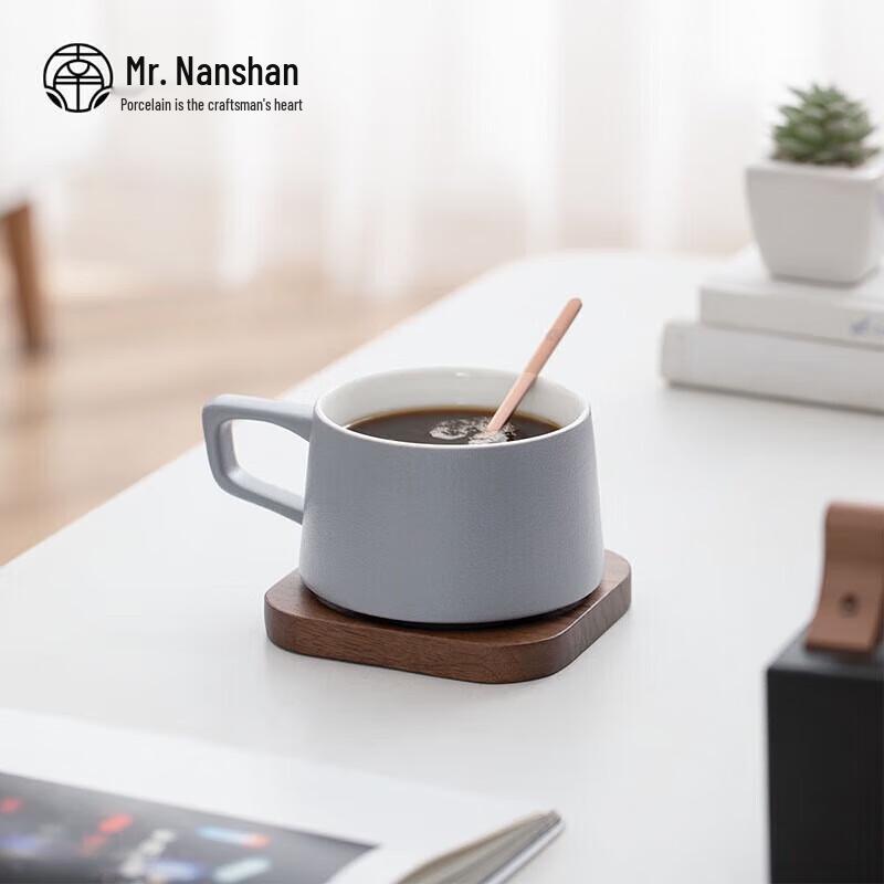 

Elegant Ceramic Coffee Cup and Saucer Set with Spoon